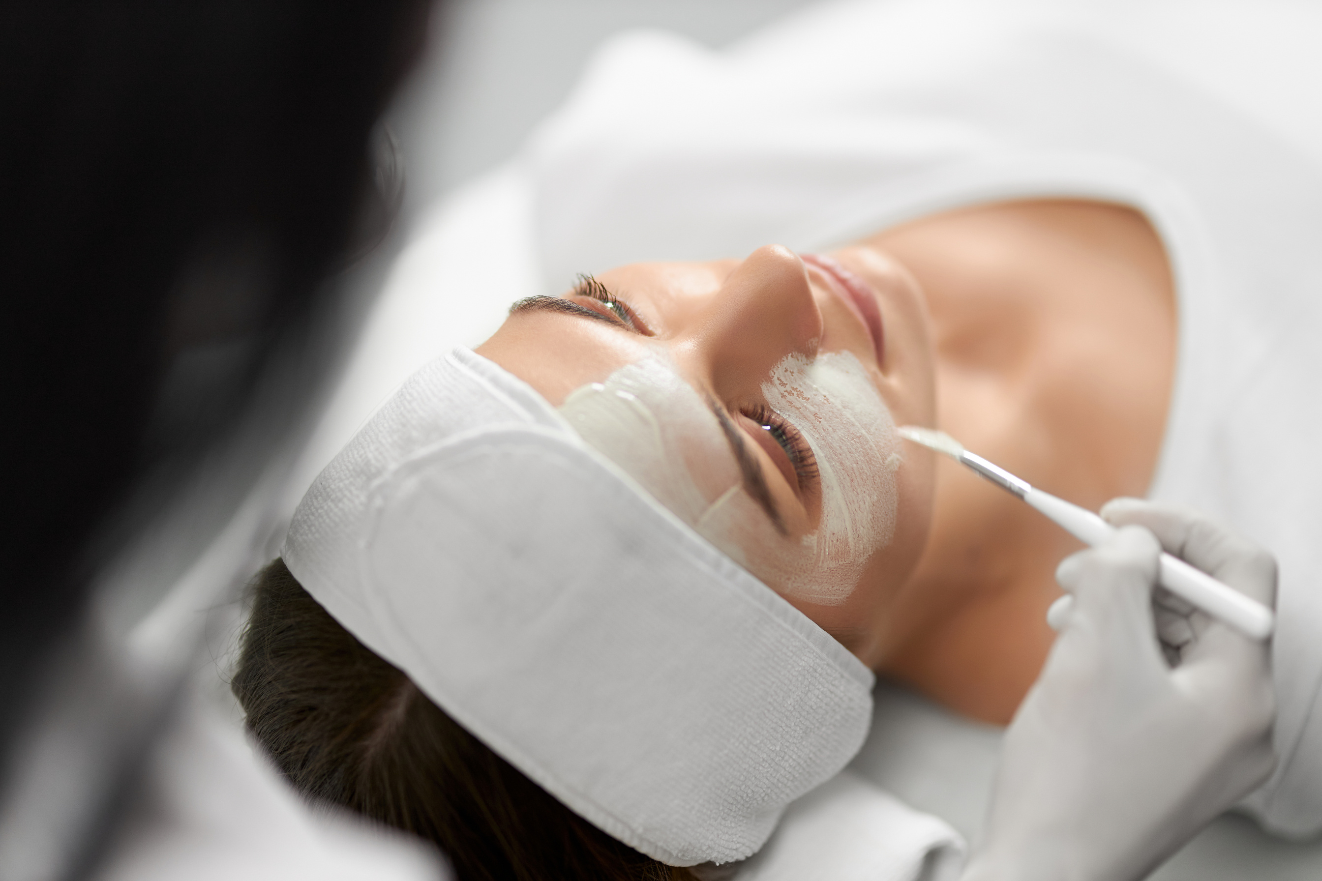 Woman on Procedure Peeling Face in Beauty Salon